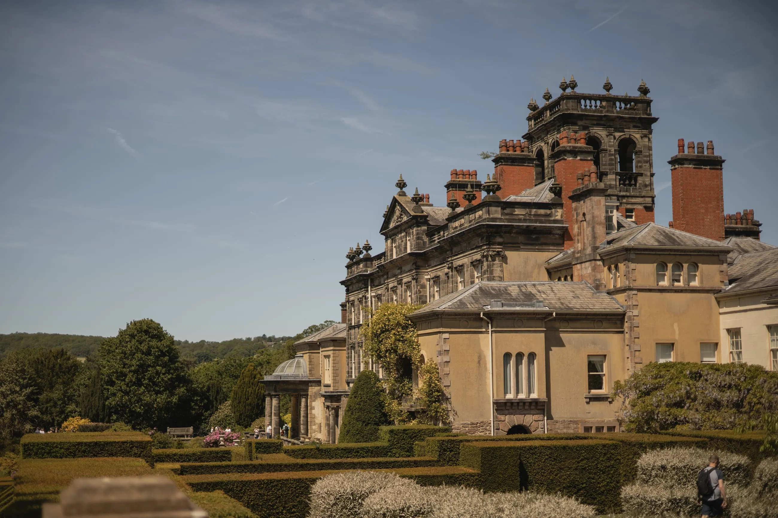 Biddulph Grange house above formal gardens, blue sky