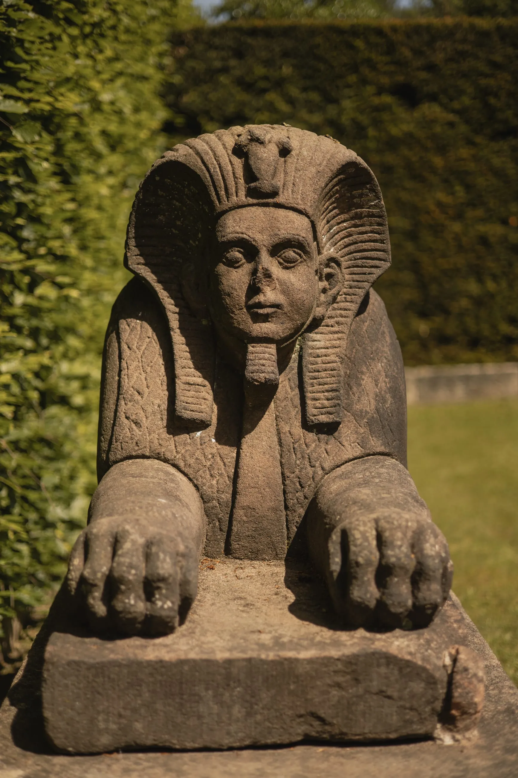 Stone sphinx guarding the Egyptian garden