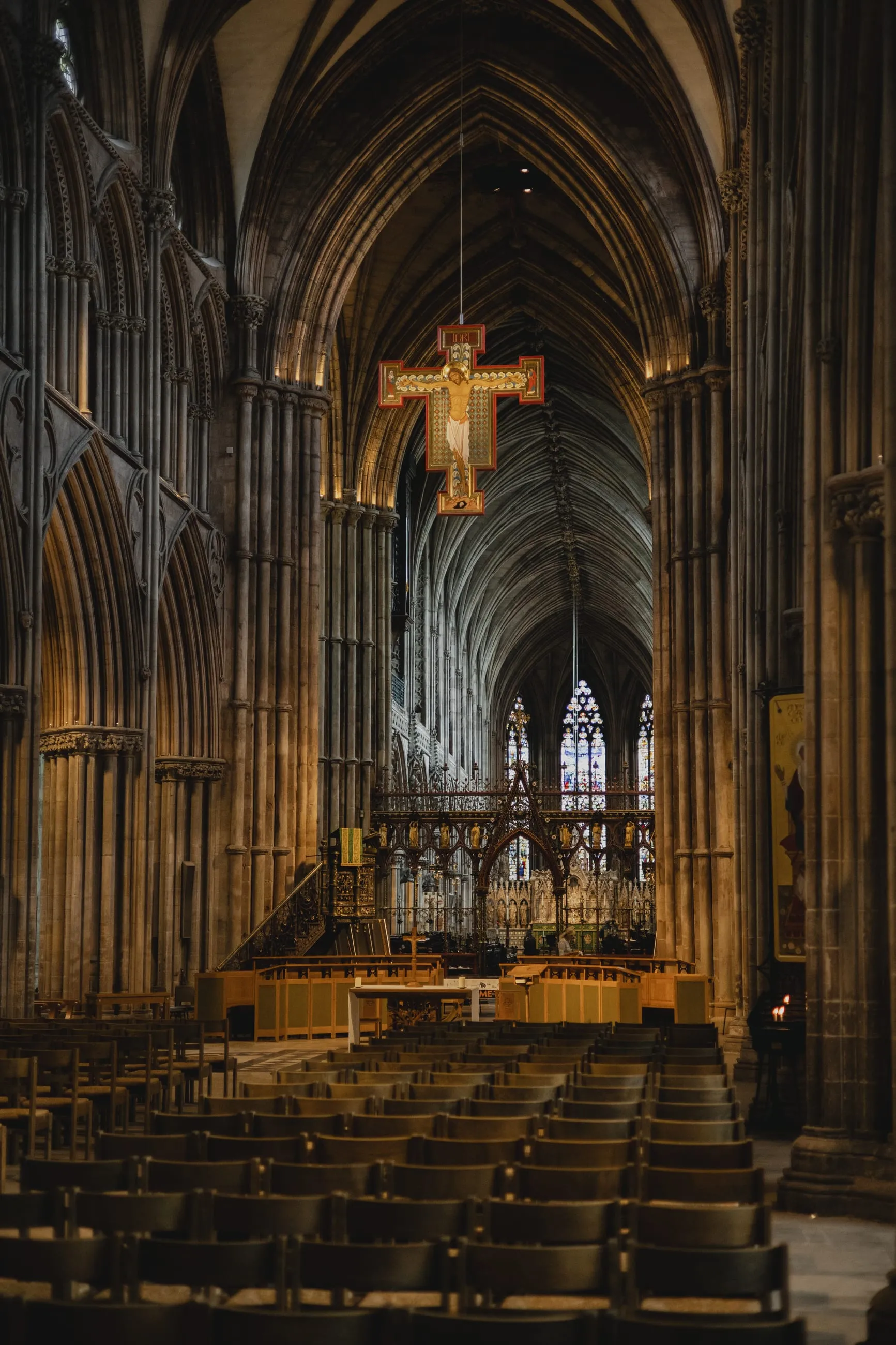 Nave looking east towards a hanging crucifix