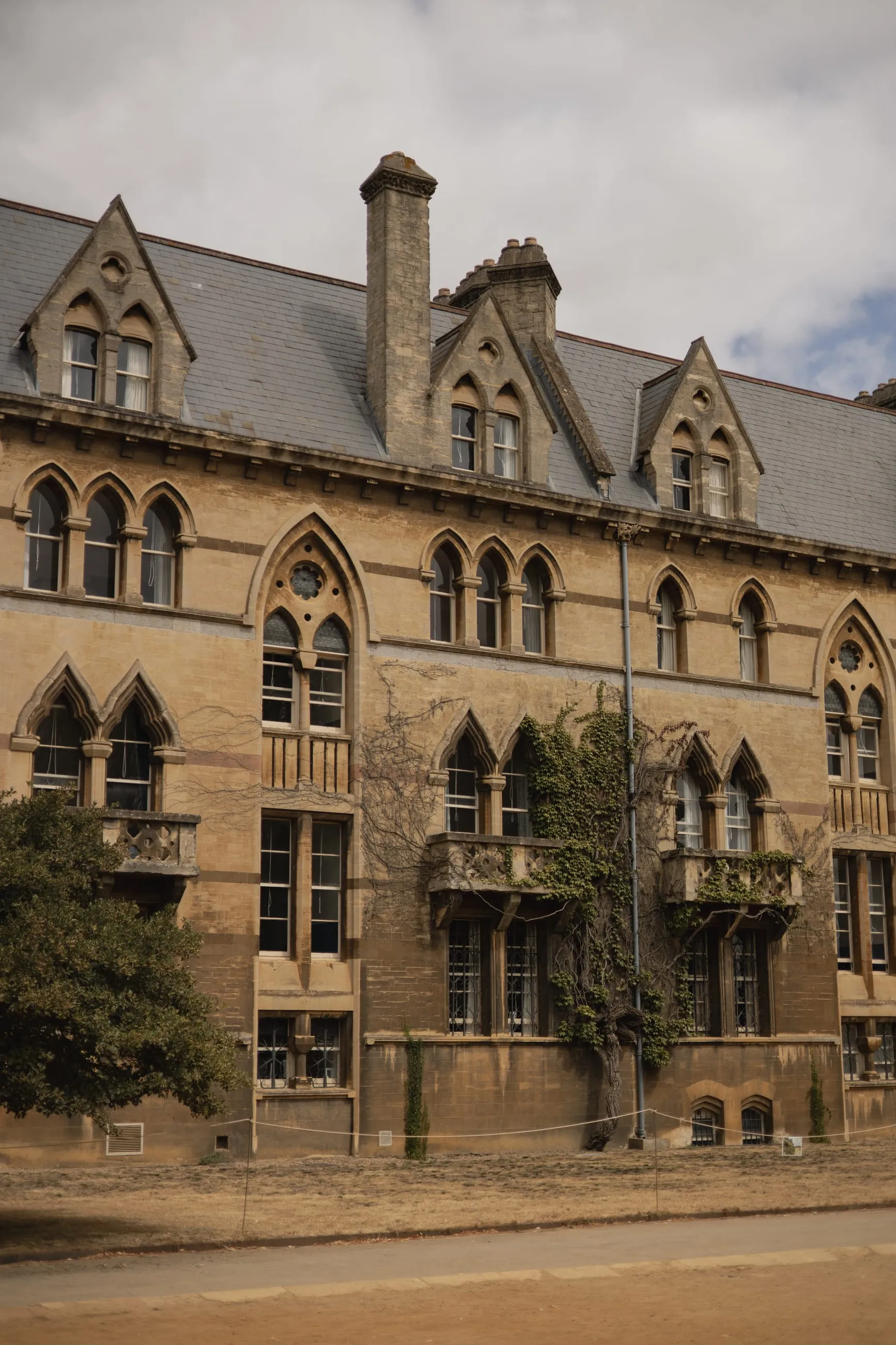 Gothic Revival facade with climbing plants