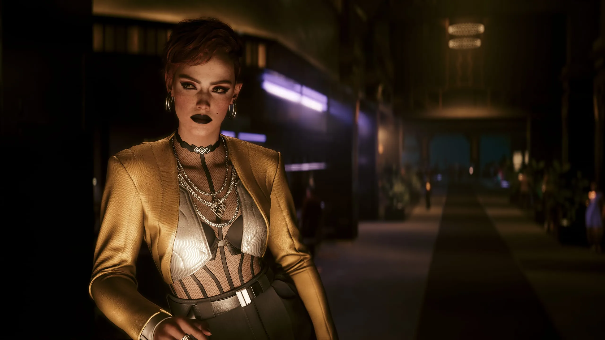 Woman in gold jacket at a dim, glamorous bar