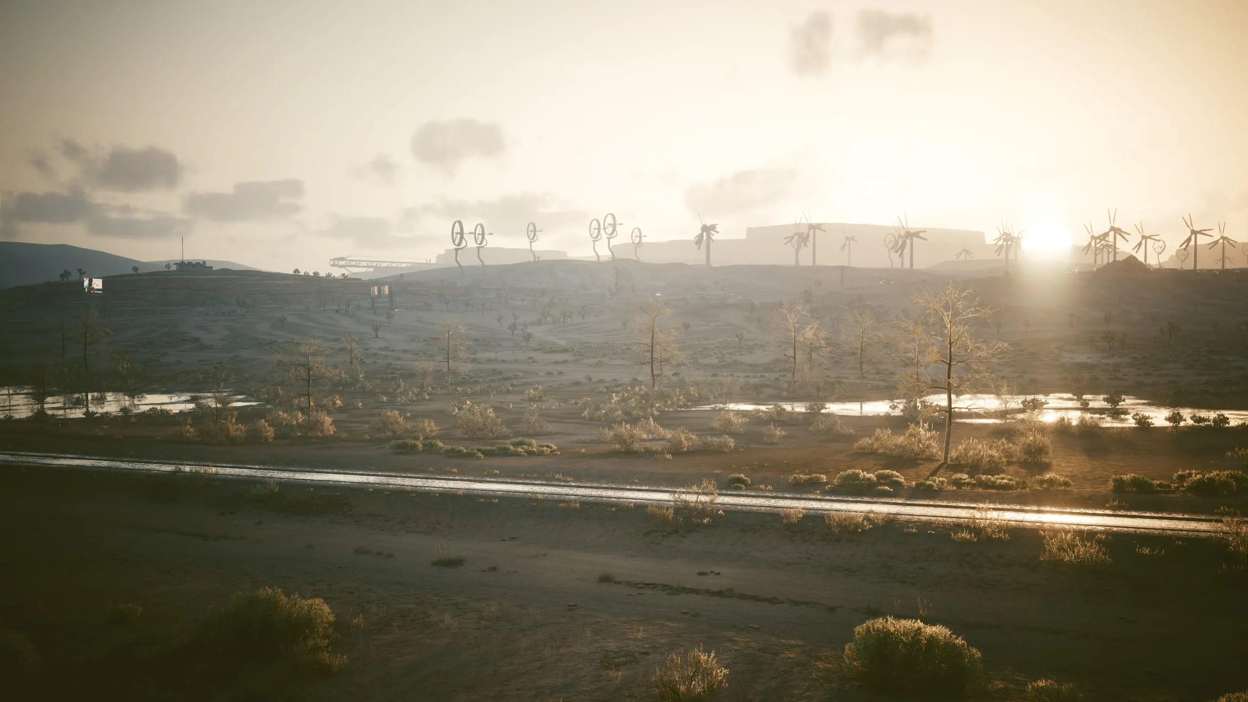 Low sun over empty badlands beyond the city