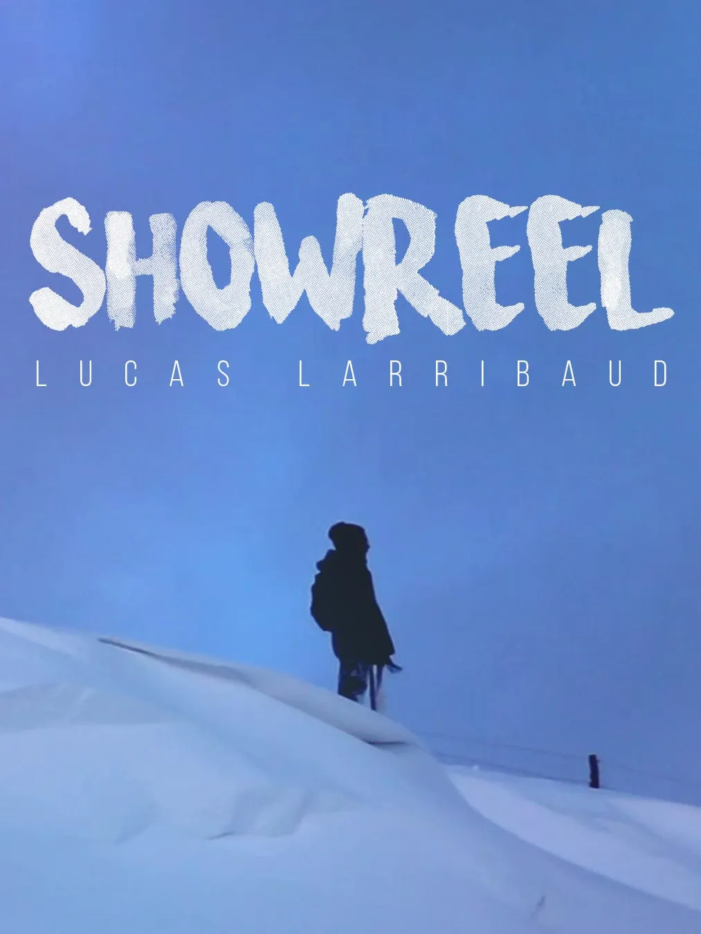 A lone figure on a snowy hill under the word Showreel